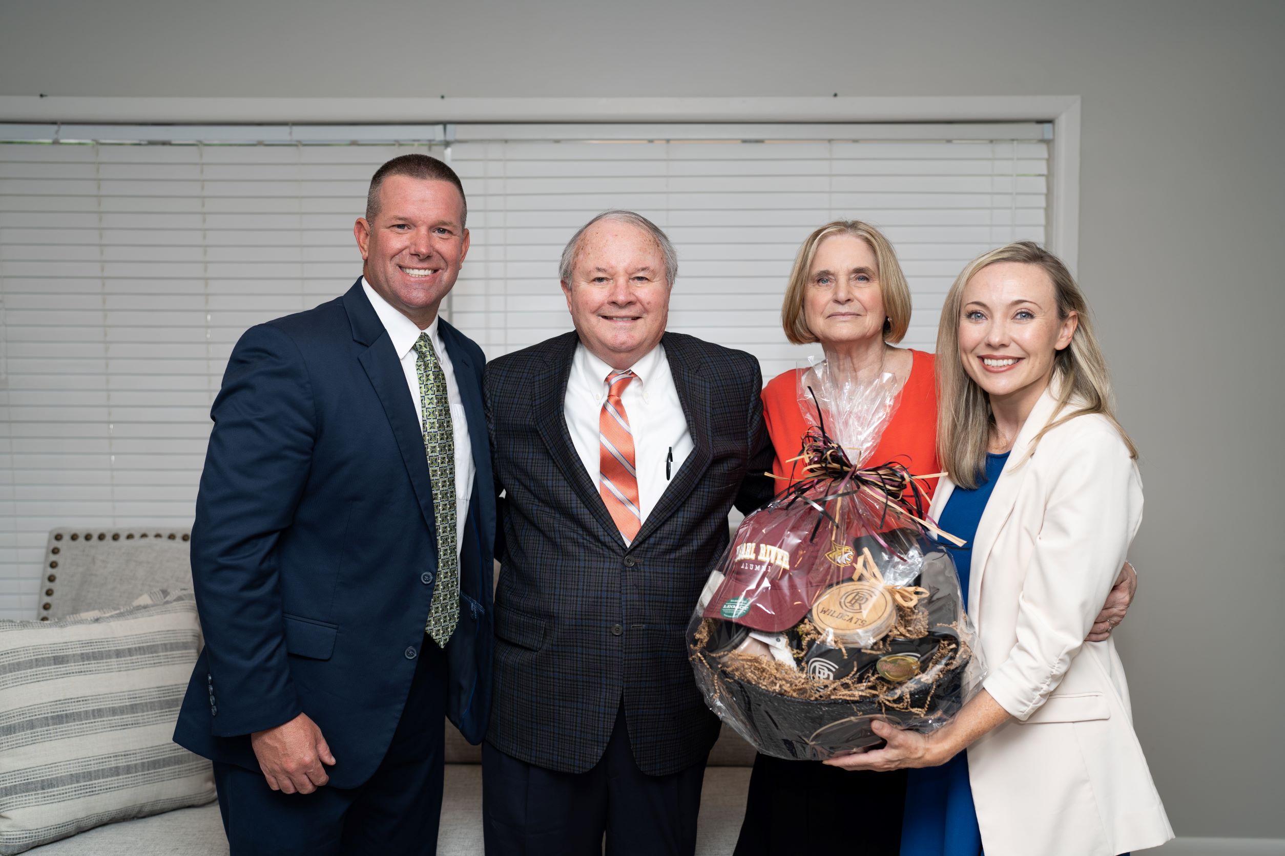 Bourgeois family recognized for donation to PRCC Foundation June 2022 with gift basket of PRCC branded merchandise