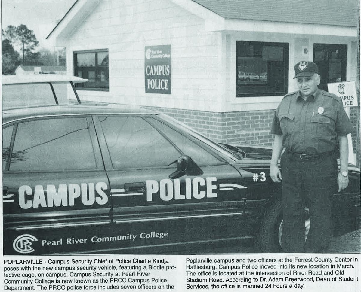 Chief Charlie Kindja stands by new cruiser outside Campus Police station on the Poplarville Campus
