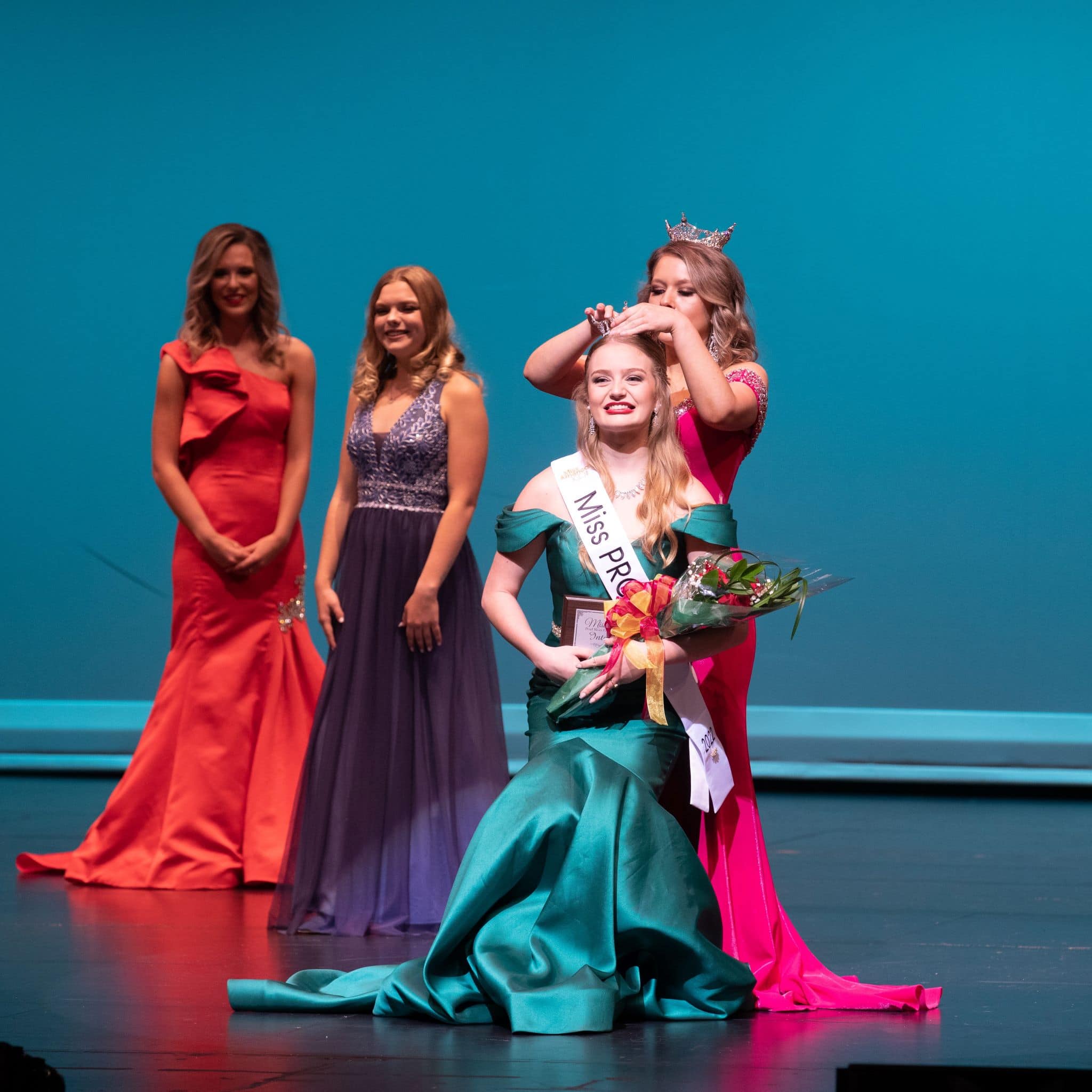 Hannah Smith crowned Miss PRCC 2022 by Miss PRCC 2021 Gabrielle Lewis