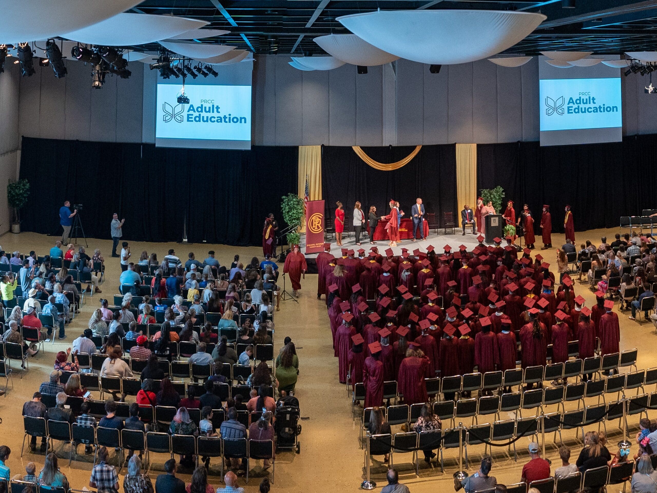 PRCC Adult Educaton Graduates walk across stage