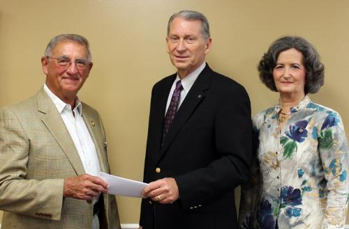 Dr. Lewis receiving grant for Women's Health Symposium