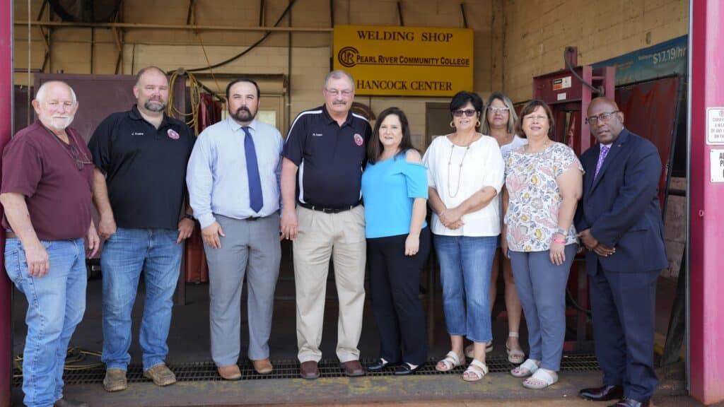 Tanner Adam Memorial Fund Officers, family and PRCC Hancock Representatives at the Welding Shop.