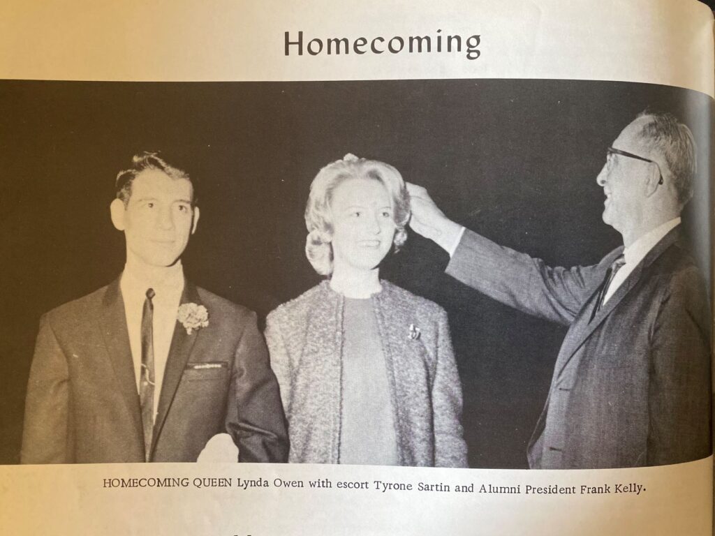 Snapshot of yearbook page showing Homecoming Queen Lynda Own with escort Tyrone Sartin and Alumni President Frank Kelly.