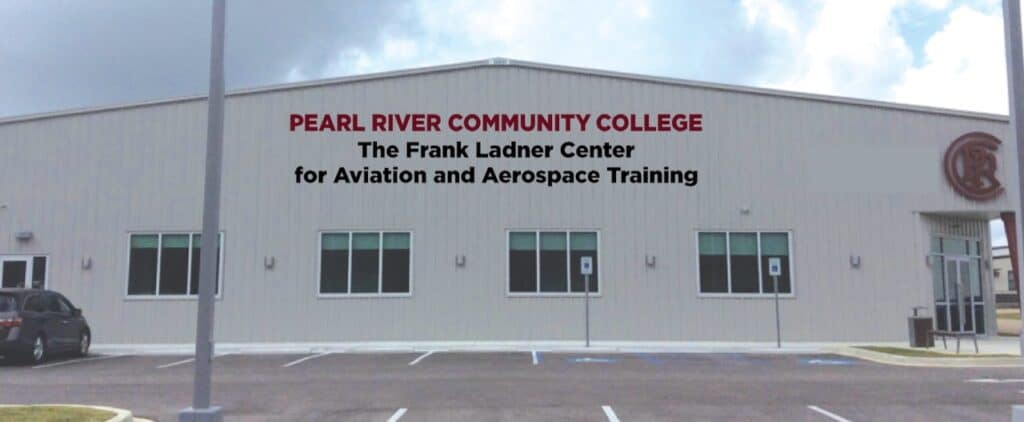 Building with sign that reads Pearl River Community College The Frank Ladner Center for Aviation and Aerospace Training.